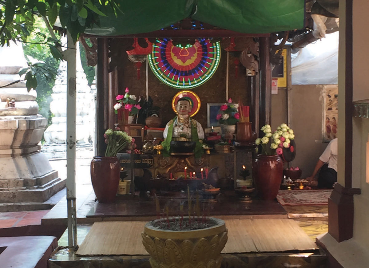 Statue of Lady Penh located outside on the temple’s grounds. Photo by Keith Lehman.